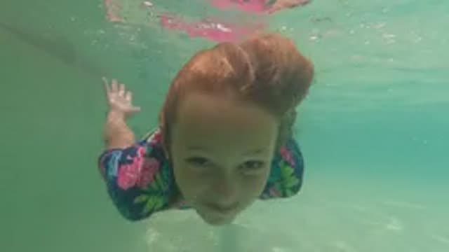 BAJA CALIFORNIA MEXICO-2022: Child Swimming Underwater in a Pool