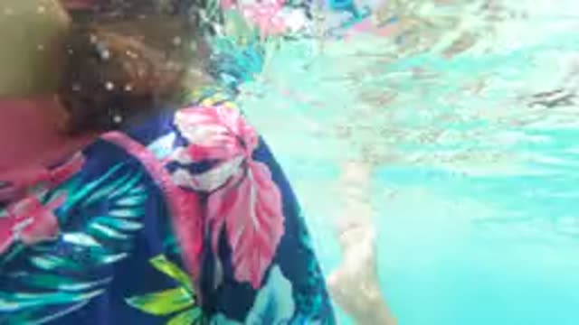 BAJA CALIFORNIA MEXICO-2022: Child Swimming Underwater in a Pool