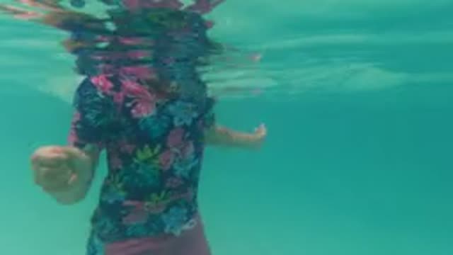 BAJA CALIFORNIA MEXICO-2022: Child Submerging and Moving Underwater in Pool