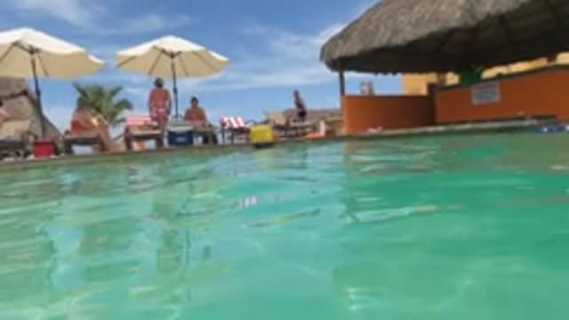 BAJA CALIFORNIA MEXICO-2022: People Using a Water Slide at a Pool