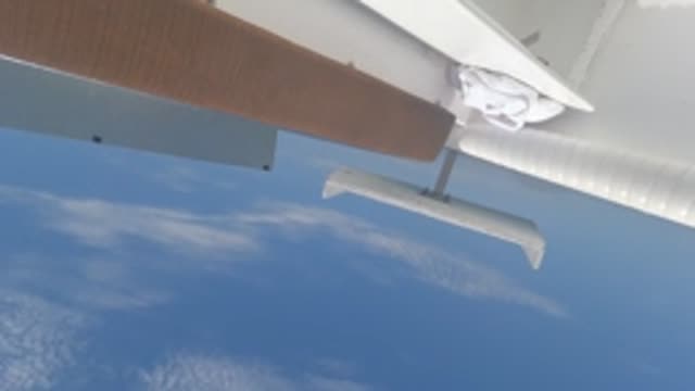 BAJA CALIFORNIA MEXICO-2022: Aircraft Wing with Drifting Clouds Below