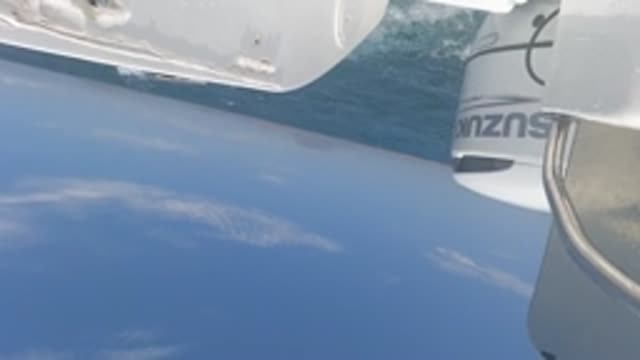 BAJA CALIFORNIA MEXICO-2022: Suzuki Outboard Motor on a Moving Boat at Sea