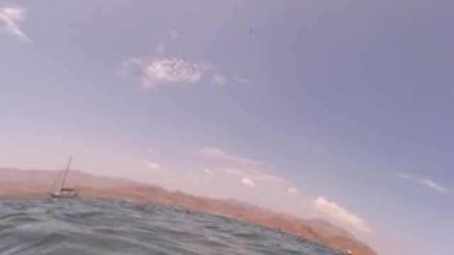 BAJA CALIFORNIA MEXICO-2022: Underwater and Ocean Surface Views with Sailboat and Mountains