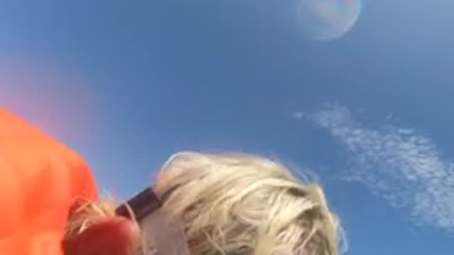 BAJA CALIFORNIA MEXICO-2022: Person Adjusting Snorkel Mask by Ocean