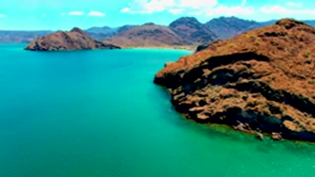 PLAYA SANTISPAC BCS MEXICO-2022: Rugged Coastal Rocks Over Turquoise Sea