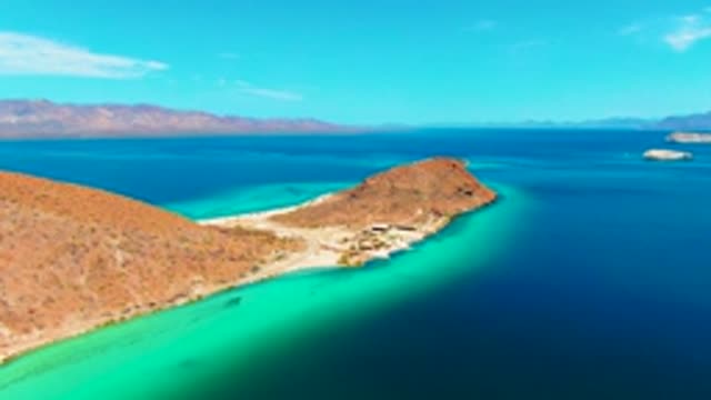PLAYA SANTISPAC BCS MEXICO-2022: Coastal Desert and Turquoise Ocean with Shifting Clouds