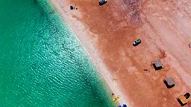 PLAYA SANTISPAC BCS MEXICO-2022: Beach with People and Vehicles in Motion