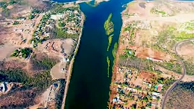 MULEGE BCS MEXICO-2022: Aerial River and Shore with Moving Vehicle