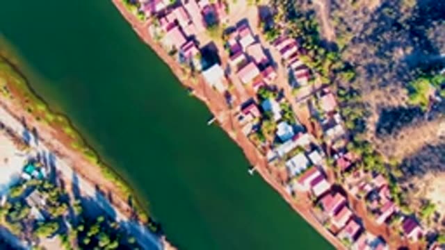 MULEGE BCS MEXICO-2022: Settlement Along River with Red Roofs