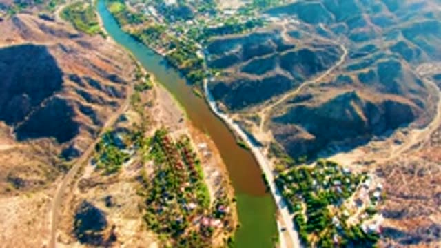 MULEGE BCS MEXICO-2022: River Winding Through Mountainous Valley