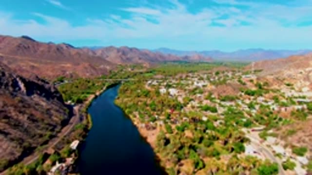 MULEGE BCS MEXICO-2022: River Through Desert Valley with Moving Vehicles