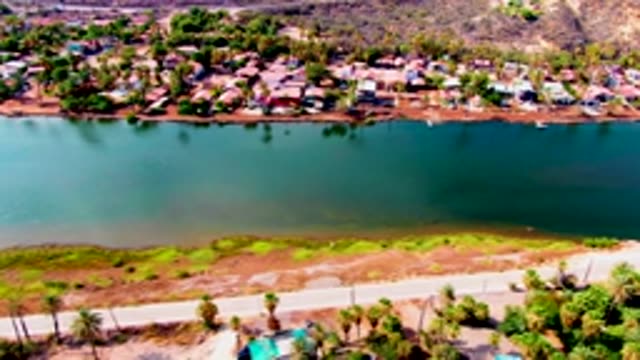 MULEGE BCS MEXICO-2022: Residential Neighborhood by Lake with Road Traffic