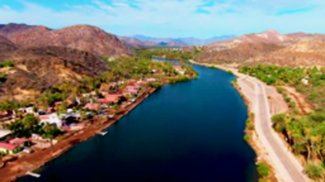 MULEGE BCS MEXICO-2022: Aerial River and Road with Car Passing