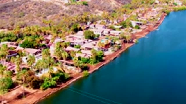 MULEGE BCS MEXICO-2022: Residential Coastal Neighborhood with Palm Trees and Water