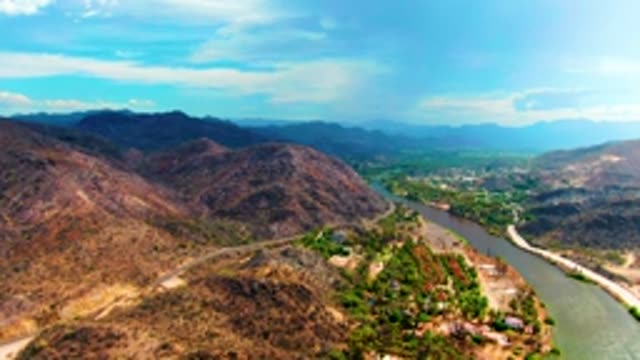 MULEGE BCS MEXICO-2022: River Flowing Through Hilly Landscape