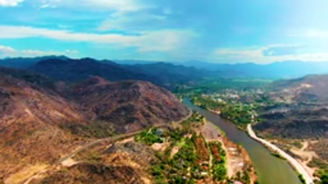 MULEGE BCS MEXICO-2022: Vehicle Moving on Riverbank Dirt Road