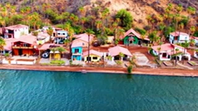 MULEGE BCS MEXICO-2022: Colorful Waterfront Houses Along a Hillside
