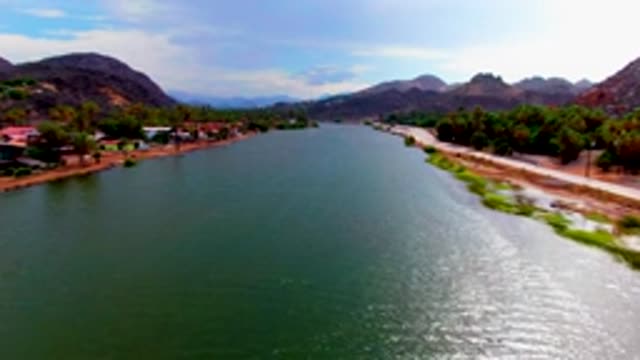 MULEGE BCS MEXICO-2022: Aerial River and Road with Mountain Backdrop