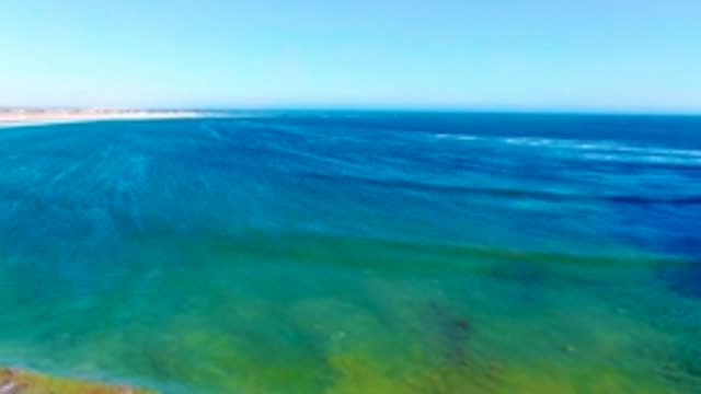 LA BOCANA BCS MEXICO-2022: Clear Blue Ocean Waters Near Sandy Beach