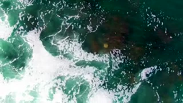 LA BOCANA BCS MEXICO-2022: Ocean Waves Moving Over Rocky Seabed