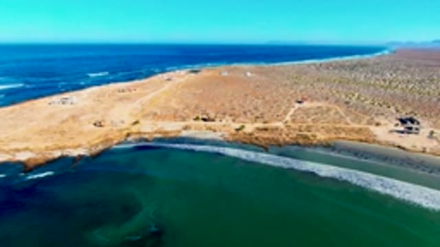 Coastal Inlet with Sandy Shore and Ocean