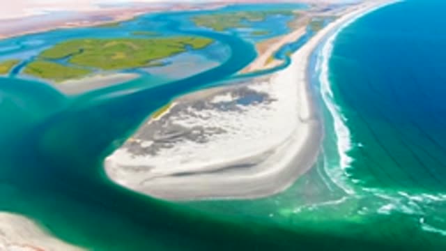 Coastal Inlet and Sandy Shore Aerial