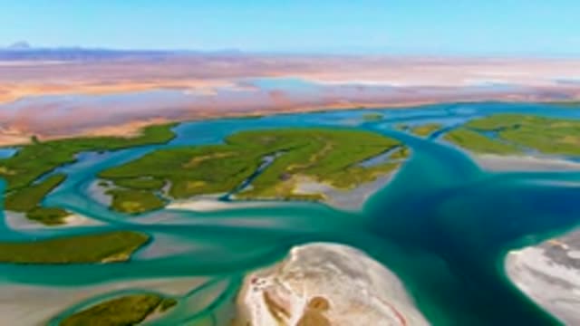 LA BOCANA BCS MEXICO-2022: Delta Waterways with Green Islands and Moving Boat