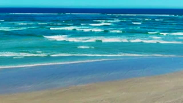 LA BOCANA BCS MEXICO-2022: Waves Rolling Toward Sandy Beach Shore