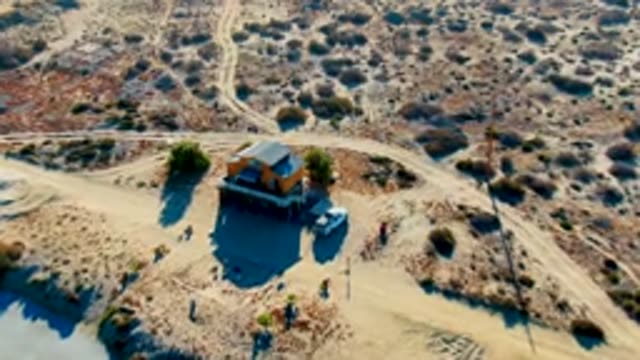 LA BOCANA BCS MEXICO-2022: People Moving near Desert Building and Vehicle