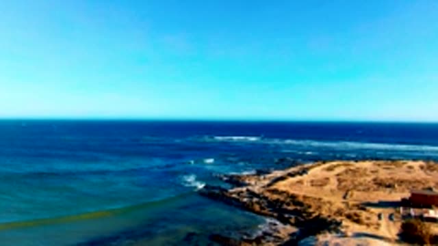 LA BOCANA BCS MEXICO-2022: Waves Breaking on Rocky Shore