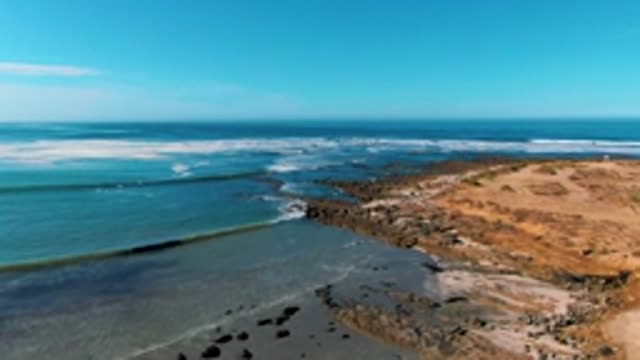 LA BOCANA BCS MEXICO-2022: Waves Crashing Onto Rocky and Sandy Shoreline
