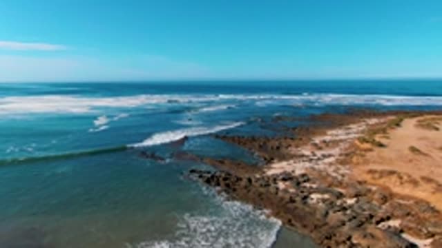 LA BOCANA BCS MEXICO-2022: Ocean Waves Breaking on Rocky Shoreline