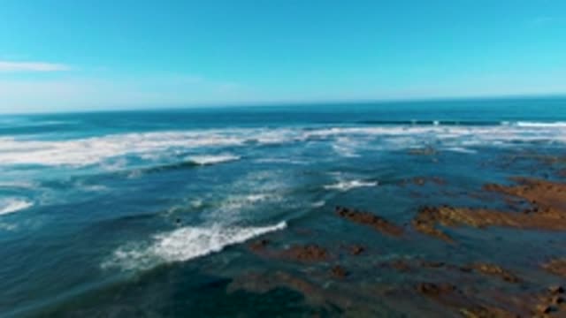 LA BOCANA BCS MEXICO-2022: Ocean Waves Breaking on Rocky Coastline