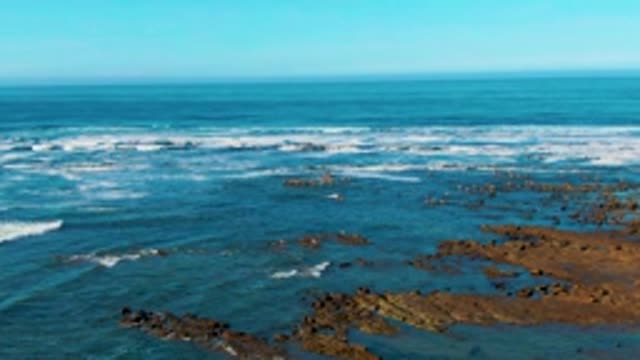 LA BOCANA BCS MEXICO-2022: Ocean Waves Crashing on Rocky Shoreline