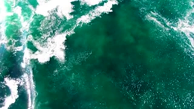 LA BOCANA BCS MEXICO-2022: Ocean Waves Moving Across Turquoise Water