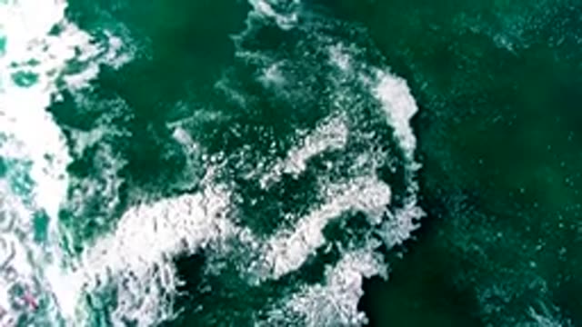LA BOCANA BCS MEXICO-2022: Receding Wave Foam on Ocean Surface