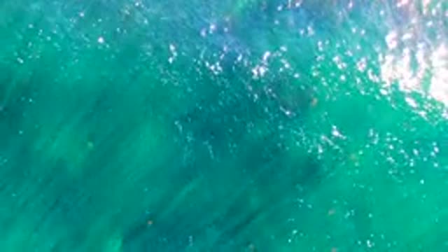 LA BOCANA BCS MEXICO-2022: Aerial View of Shimmering Turquoise Ocean Surface