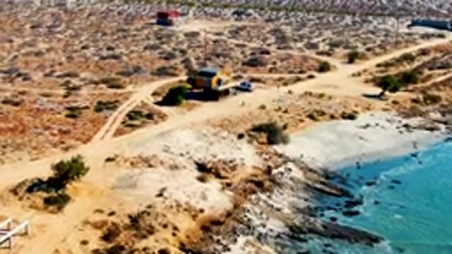 LA BOCANA BCS MEXICO-2022: Desert Coast with Small Building and Ocean