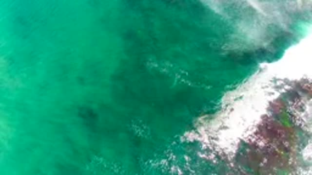 LA BOCANA BCS MEXICO-2022: Waves Breaking on Turquoise Ocean Rocks