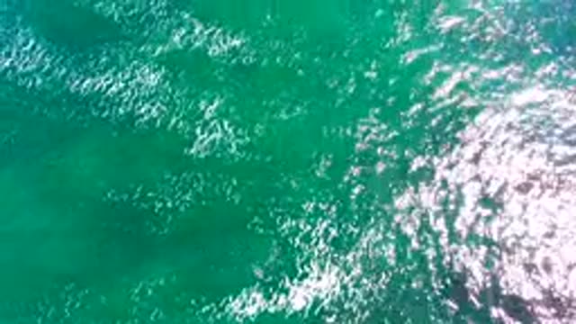 LA BOCANA BCS MEXICO-2022: Clear Turquoise Ocean Water with Sunlight and Submerged Rocks