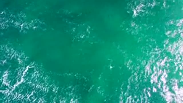 LA BOCANA BCS MEXICO-2022: Gentle Ocean Waves on Turquoise Water Surface