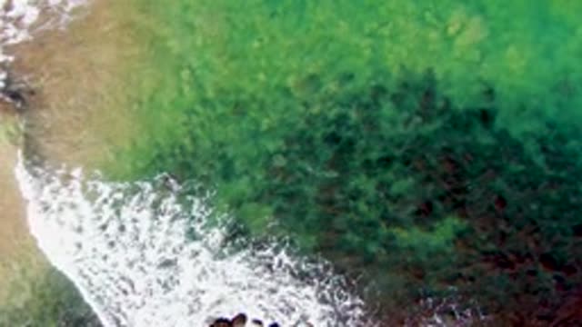 LA BOCANA BCS MEXICO-2022: Ocean Waves Rolling Onto Sandy Shore
