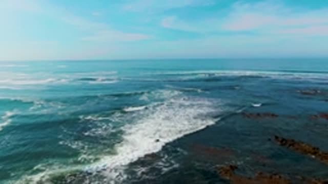 LA BOCANA BCS MEXICO-2022: Waves Crashing Against Rocky Shoreline