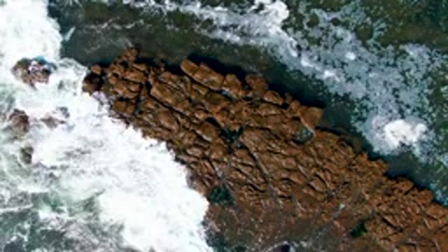 LA BOCANA BCS MEXICO-2022: Waves Crashing Against Rocky Shoreline Overhead