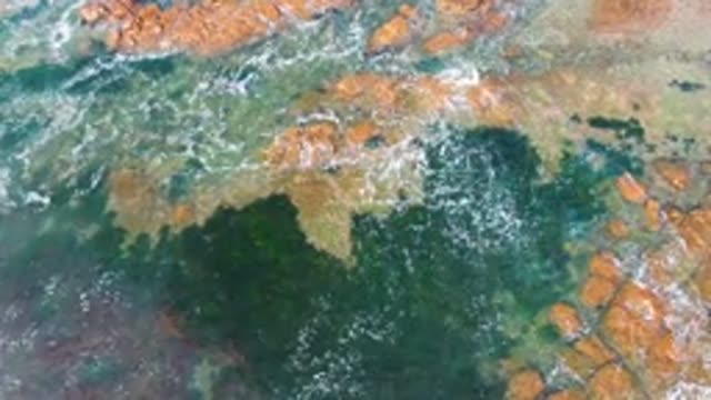 LA BOCANA BCS MEXICO-2022: Waves Gently Lapping Rocky Shore Overhead