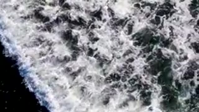 LA BOCANA BCS MEXICO-2022: Foam Spreading Across Ocean Water Surface