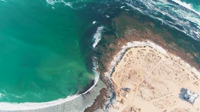 LA BOCANA BCS MEXICO-2022: Coastal Waves Crashing on Sandy Shoreline