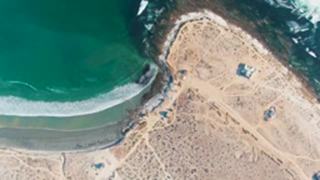 LA BOCANA BCS MEXICO-2022: Gentle Ocean Waves Lapping Sandy Coastline