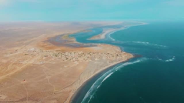 LA BOCANA BCS MEXICO-2022: Coastal Desert Settlement with Moving Vehicle