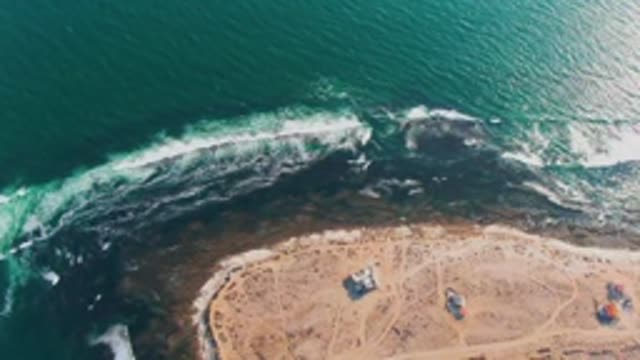 LA BOCANA BCS MEXICO-2022: Waves Breaking on Sandy Coastal Shore